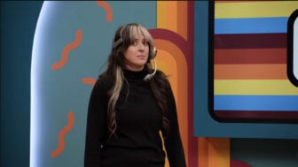 Screenshot from Game Changer featuring Kaylin Mahoney in wide-eyed terror